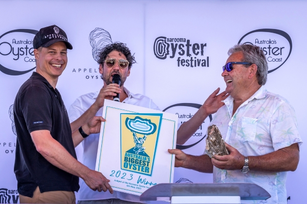 Australias Oyster Coast manager Davin, chef colin Fassnidge and farmer Berni Connell stand together after Berni won Australia's Biggest Oyster in 2023.